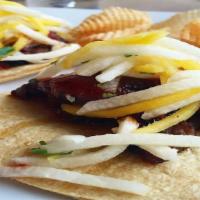 Barbequed Duck Tacos · Mango Jicama Slaw, Chipotle Aioli
Potato Gaufrette