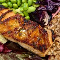 Miso Salmon Bowl · Miso marinated Salmon, organic greens, steamed farro, edamame, ginger red cabbage slaw, miso...