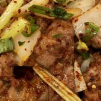 Spicy Cumin Lamb孜然羊 · Little spicy. Sliced lamb sauteed with cumin powder and chopped dry chili.