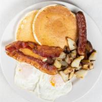 Breakfast Combo · Two eggs, two pancakes, two slices of bacon, one sausage and home fries.