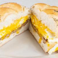 Two Eggs With Meat And Cheese · Bacon, sausage or ham on roll.