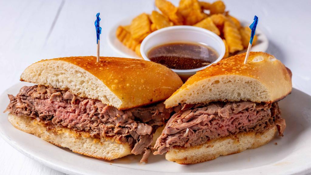 French Dip Sandwich · Shaved prime slow cooked roast beef dipped in au jus on a hero with horseradish sauce and au jus on the side. Add fries for a small up-charge.