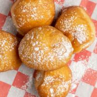 Zeppoles 5 Pieces · Crispy on the outside, yet light and fluffy on the inside. These mini Italian donut holes wi...
