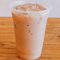 Black Milk Tea · Our classic black Assam tea brewed daily with plant-based milk (oat or almond milk-your choi...