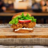 Honey Ole Chipotle Fried Chicken Sandwich · Crispy fried chicken, mozzarella cheese, pickles, lettuce, onion, tomato, mayo, and honey ch...