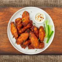 Chicken Wing Dings · Fresh chicken wings breaded and fried until golden brown. Served with a side of ranch or ble...