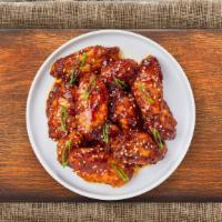 Teriffic Teriyaki Wings · Fresh chicken wings breaded, fried until golden brown, and tossed in teriyaki sauce. Served ...