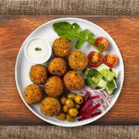 I Fell For Falafel · Baked and fried mixture of garbanzo beans, fava beans, coriander, cumin, parsley and onions....
