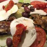 Caprese Salad · Fresh mozzarella, basil, tomato and olive oil.