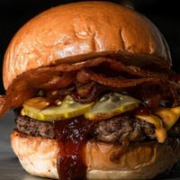 Blue Cheese Bacon Burger · Our famous cheeseburger with blue cheese dressing and bacon. Decadent and filling.