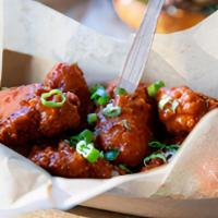 Boneless Wings - 5 Piece · Chicken breast chunks breaded in seasoned flour. Tossed in your preferred wing sauce, served...