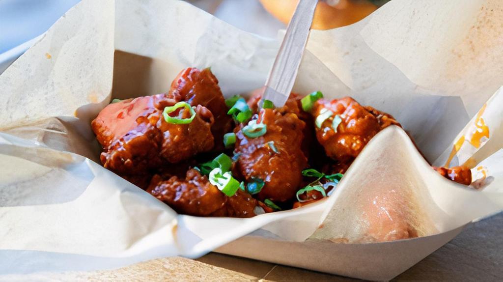 Boneless Wings - 15 Piece · Chicken breast chunks breaded in seasoned flour. Tossed in your preferred wing sauce, served with blue cheese on the side.