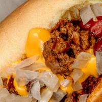 Bacon Chili Dog · Potato roll with Feltman's hot dog, topped with homemade chili sauce, melted nacho cheese sa...