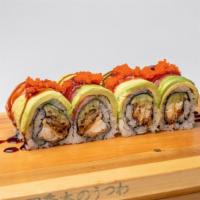 Goblin Roll ☣ · Soft shell crab, cucumber, masago roll with tuna, salmon, avocado and sweet sauce on top.