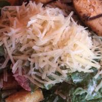 Caesar Salad With Chicken · Chopped lettuce, parmesan cheese, croutons, caesar dressing.