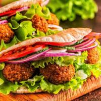 Ali Baba Panini · Yummy Falafel with hummus (contains sesame), red onions, red peppers, pickles.