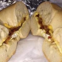 Bacon, Egg, & Cheese Sandwich · Three crispy bacon, egg, and American cheese. No cheese order, we will add an extra strip of...