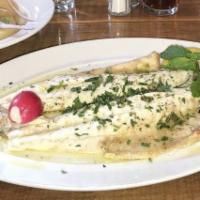 Lavraki · Mediterranean sea bass grilled with extra virgin olive oil.