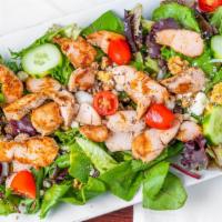 Mixed Baby Greens Salad · With dried cranberries, glazed walnuts, tomatoes, cucumbers and feta cheese.