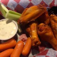 Buffalo Wings · Served with blue cheese.