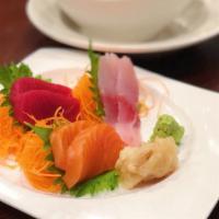 Tri-Color Sashimi · Tuna, scottish salmon, white fish of the day.