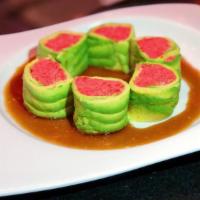 Volcano Roll · Inside: spicy tuna; outside: avocado (no rice), yuzu dressing.