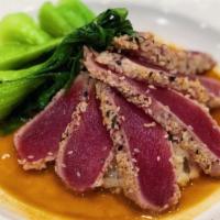 Sesame Crusted Yellowfin Tuna · Sesame ginger vinaigrette.