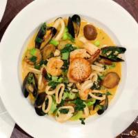 Thai Curry Seafood Bouillabaisse · Diver scallop, shrimp, calamari, mussels, bok-choy, potatoes, and fennels.