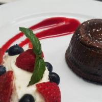 Chocolate Lava Cake · Vanilla ice cream & raspberry sauce