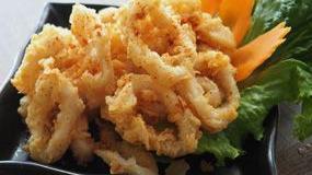 Crispy Calamari · Golden-fried calamari. Served with Thai sweet chili sauce.