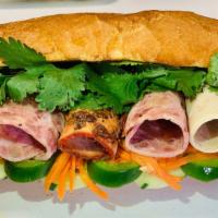 Baguette Special 1 Sandwich / Bánh Mì Đặc Biệt 1 · Includes ham, bologna and roast porks.