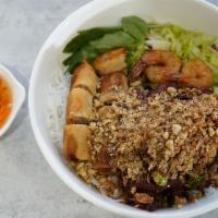 Combination Vermicellis / Bún Đặc Biệt · Pork or beef, grilled shrimp, egg roll, ground pork and shrimp wrap in sugar cane.