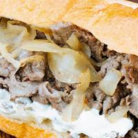 Fresh Onion Cheese Steak · A cheese steak topped with creamy horseradish sauce,caramelized onions and Swiss cheese.  Co...