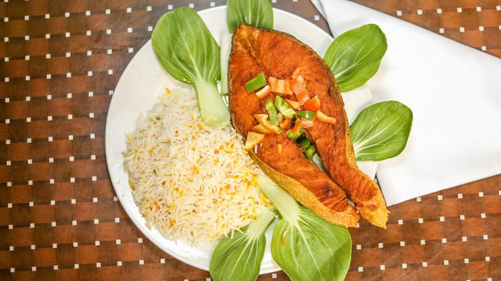 Tandoori Fish · Fresh fish marinated in herbs and spices then barbequed to perfection.