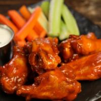 Wings · 8 Bone-in or boneless jumbo wings served with carrots & celery
