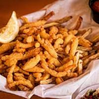 Clam Strips Basket · Crispy Clam strips served with tartar sauce and one side