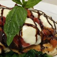 Chicken Napoli · Grilled chicken with roasted peppers, portobello mushrooms, and. melted mozzarella. Served o...