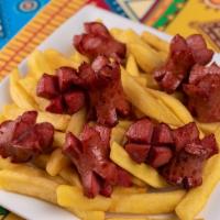 Salchipapa · Sliced hot dogs and crunchy French fries accompanied with ketchup, mustard, and mayonnaise f...