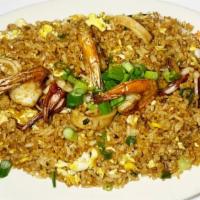 Chaufa De Mariscos · A Chinese-Peruvian seafood fried rice fusion. Accompanied with mussels, shrimps, calamari, a...