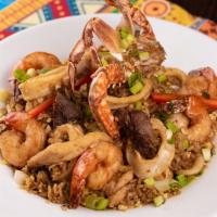 Chaufa Especial · A Chinese-Peruvian chicken, steak, and seafood fried rice fusion. Accompanied with, shrimps,...