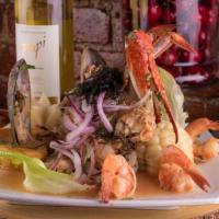 Ceviche Mixto · Freshly sliced fish fillet, shrimps, calamari, mussel, and crab marinated in lime juice and ...