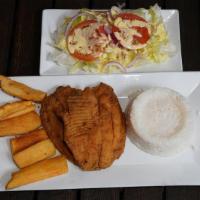 Pescado Frito (Filete) · Two fried tilapia fish served with white rice, fried cassava and topped with cilantro.