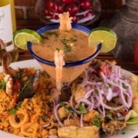 Mariscada · Our popular combination of our minced fish Leche de tigre, Peruvian crab, shrimps, calamari,...