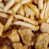 Chicharron De Pollo · Deep-fried chicken cuts with French fries.
