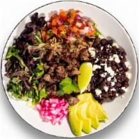 Carne Asada Bowl · Thinly sliced grilled sirloin, marinated black beans, queso fresco, pickled red onion, pico ...