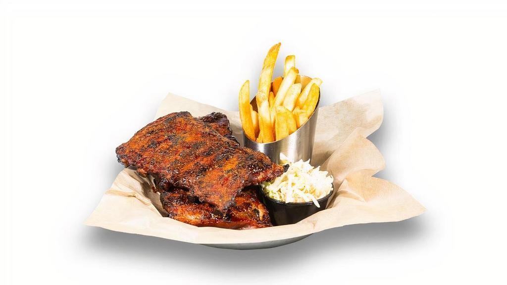 Old Bay Bbq Ribs · Slow-smoked & grilled St. Louis style. pork ribs basted with smoky BBQ sauce and dusted with Old Bay®, served with fries and house slaw