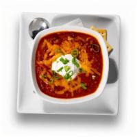 Hearty Chili · Award-winning mild chili with beans, served with cheddar cheese, sour cream, scallions