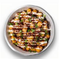 Loaded Tater Tots · Fat Tire beer cheese, bacon, homemade ranch, scallions
