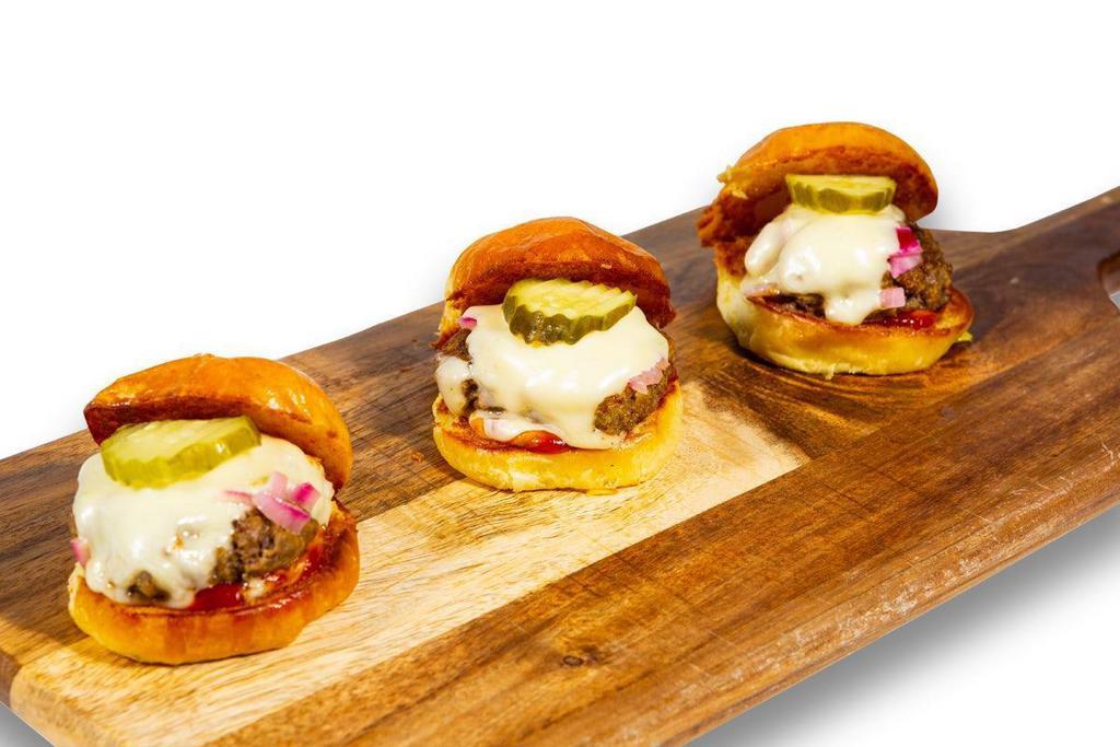 Slamburger Sliders · Three mini burgers, American cheese, pickled red onion, ketchup, mustard, pickles