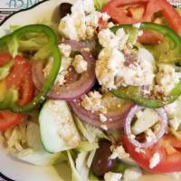 Greek Delight Salad · Mixed with wine vinegar, olive, feta cheese and olives, served with pita bread